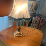 Vintage Neo-Rococo bedside lamp with fringed shade.