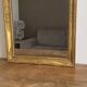 Golden mirror from the late 19th century with decoration. 96x68.