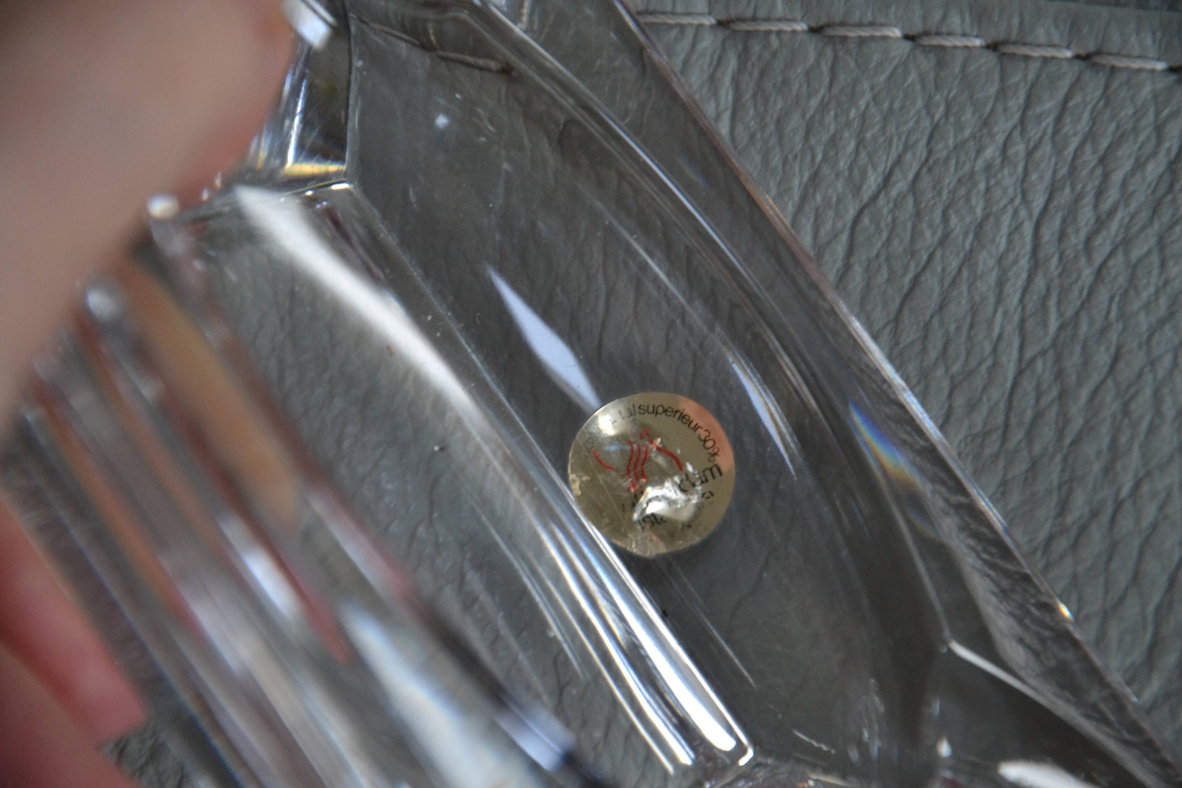 Antique crystal ashtray with its leather stand