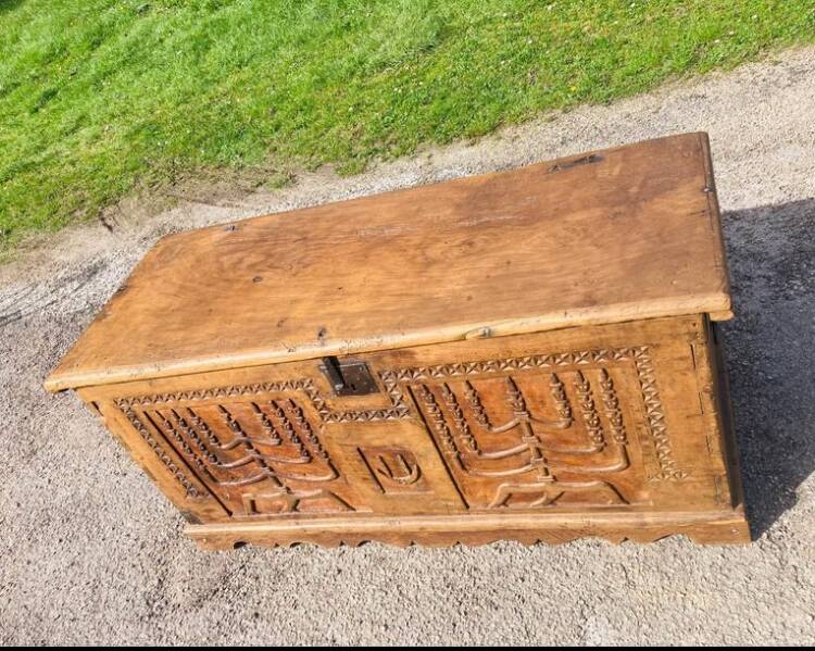 18th century chest, front view, carved with Menorahs and Hebrew symbols