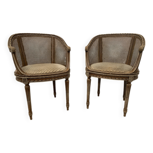Paire de fauteuils corbeille