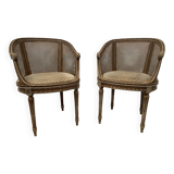 Pair of Louis XVI style basket armchairs in patinated beech, 20th century