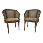 Pair of Louis XVI style basket armchairs in patinated beech, 20th century