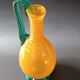 Vintage orange and green blown glass bottle, art glassware