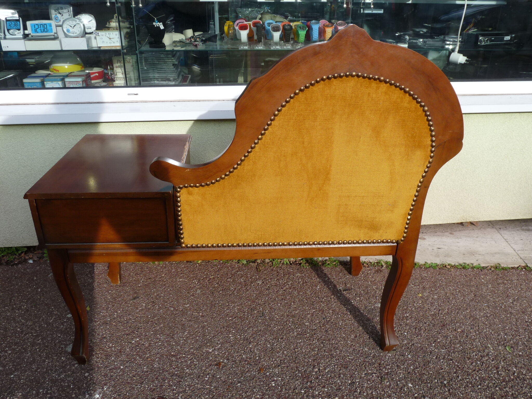 Old furniture phone with seating