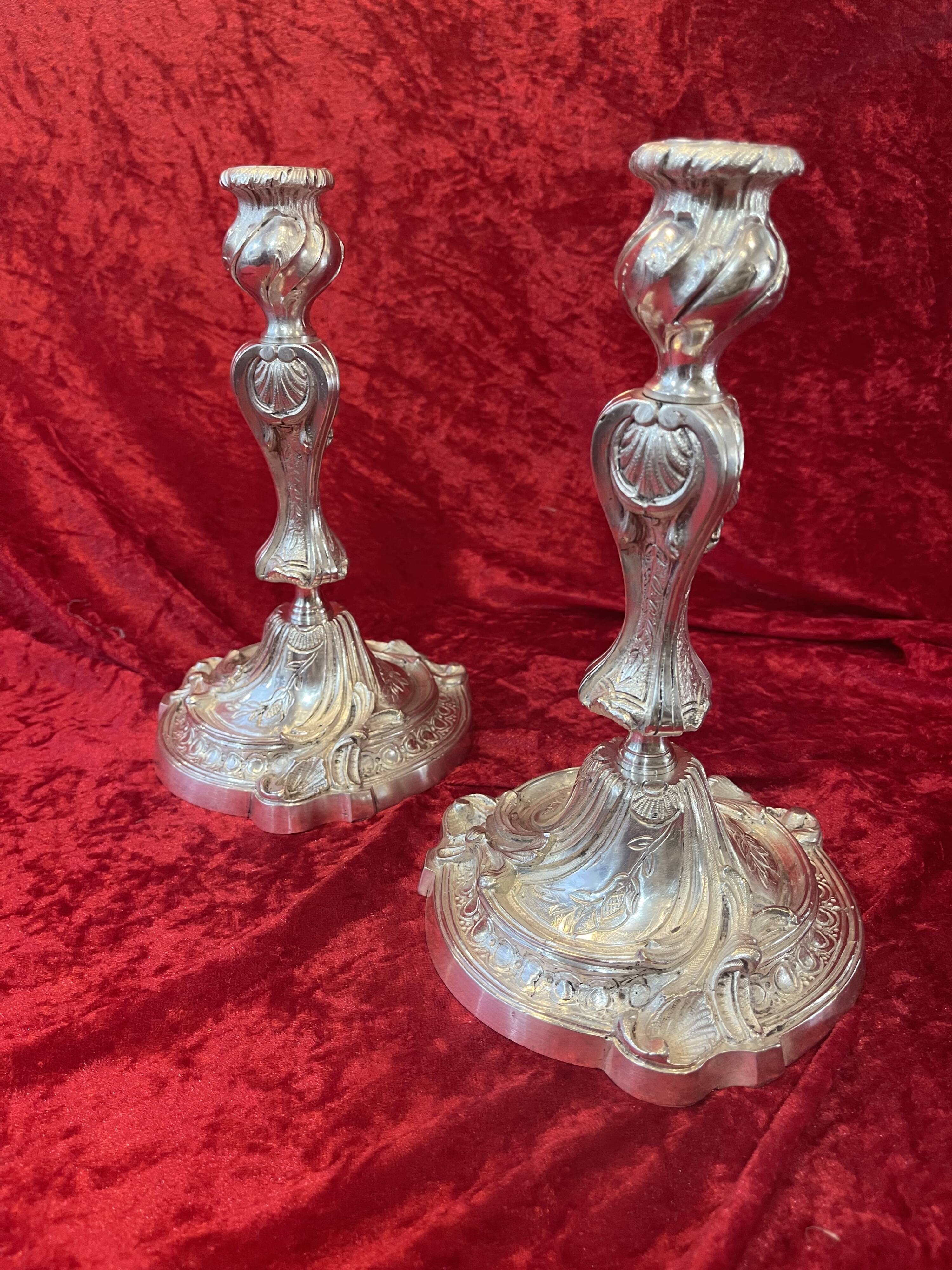 Pair of candlesticks, torches in silver bronze