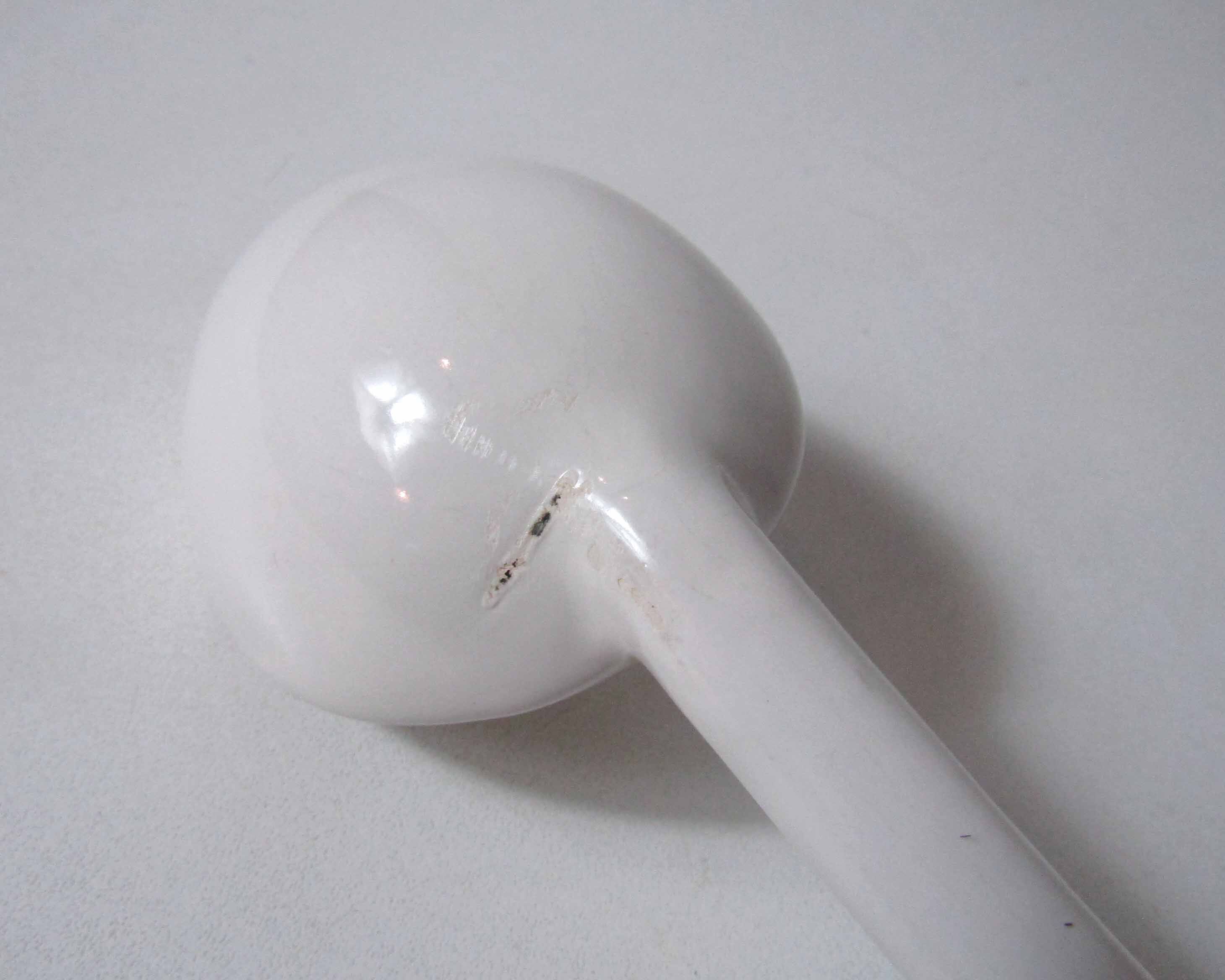 Ladle in white ceramic