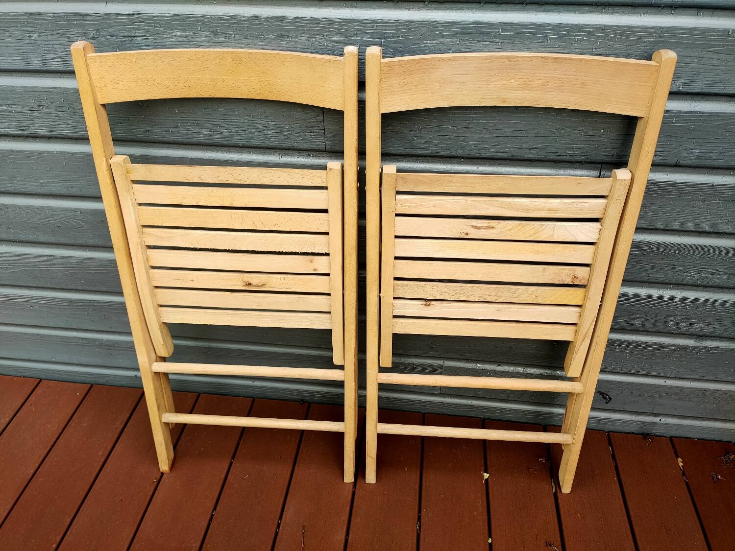 Pair of wooden folding chairs