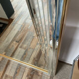 Large vintage Hollywood Regency style mirror with shutters.