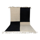 Handmade white and black beret rug