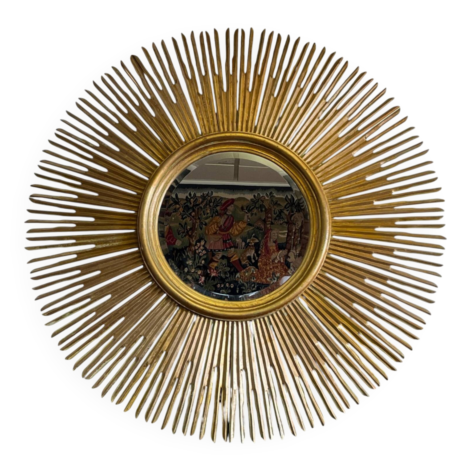Large sunburst mirror with beveled glass and gilded wood from around 2010.