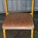 Pair of school chairs, wood and yellow metal, industrial decor.