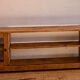 Vintage oak sideboard TV unit with sliding doors.