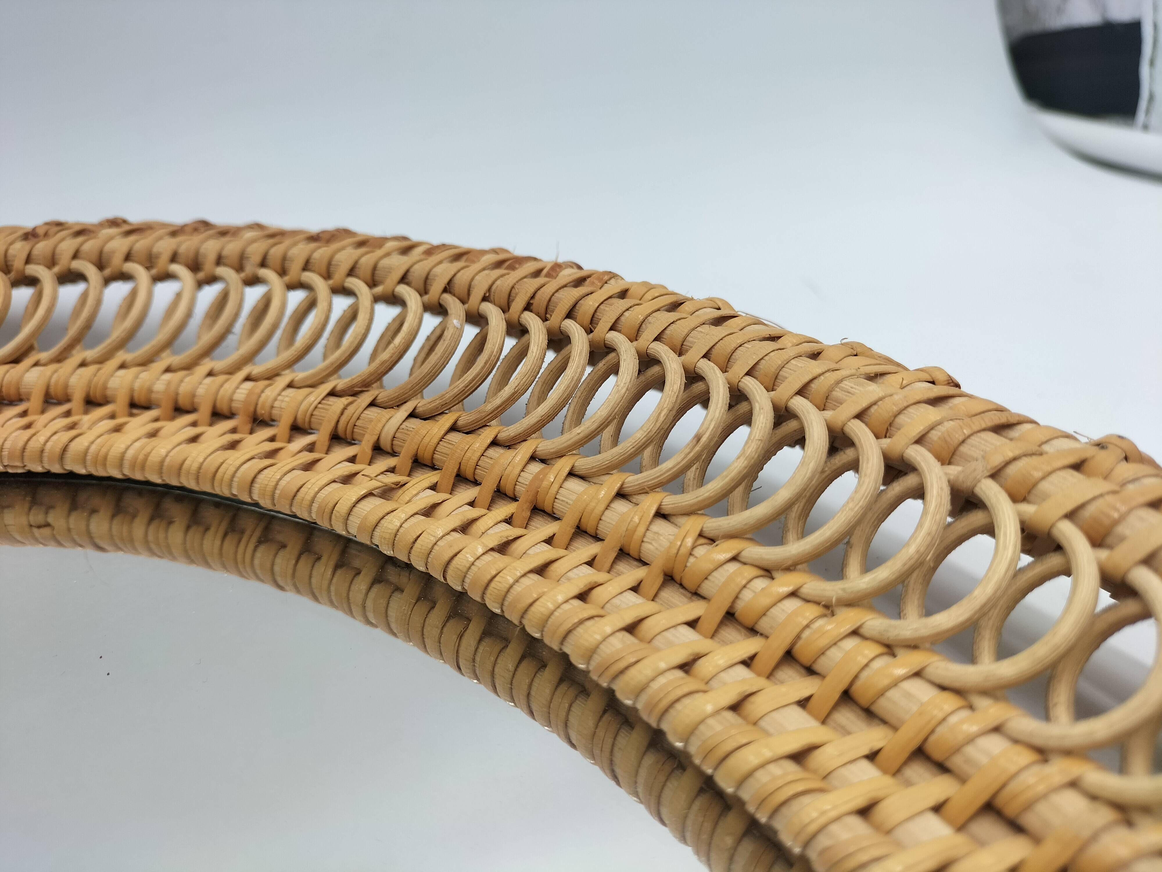 Oval rattan mirror
