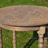 old small round oak table with can legs