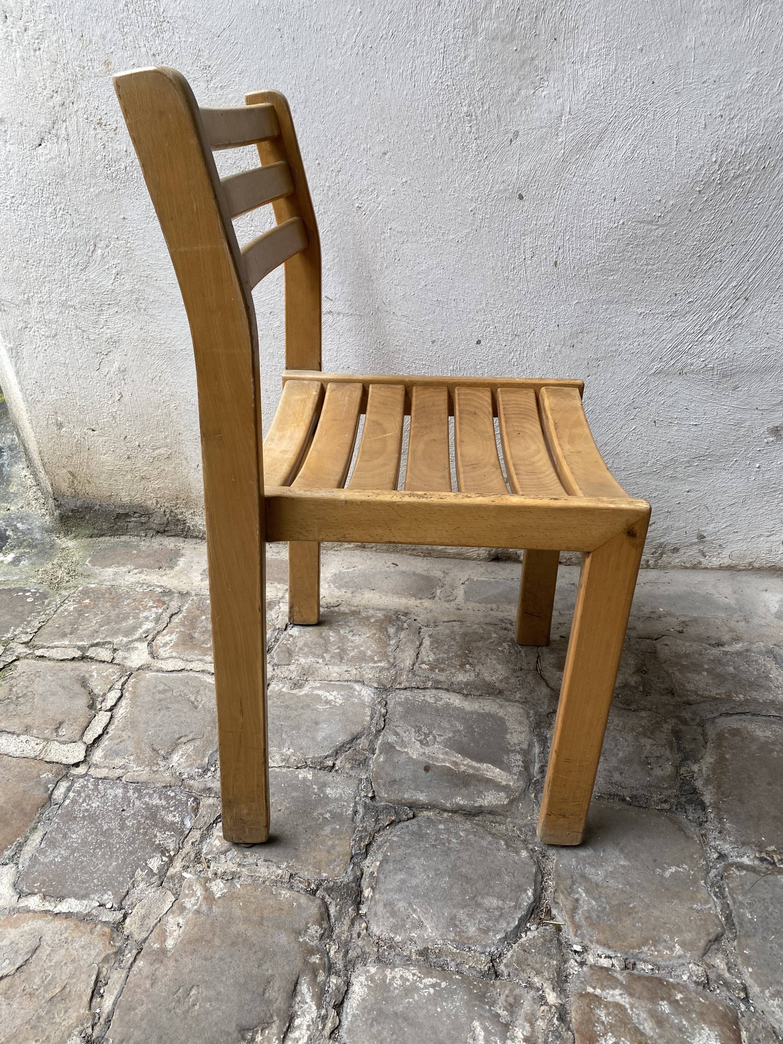 Series of 6 XXth chairs in varnished oak