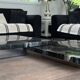 Coffee table made up of two designer tables in faux marble resting on chrome legs by Willy Rizzo.