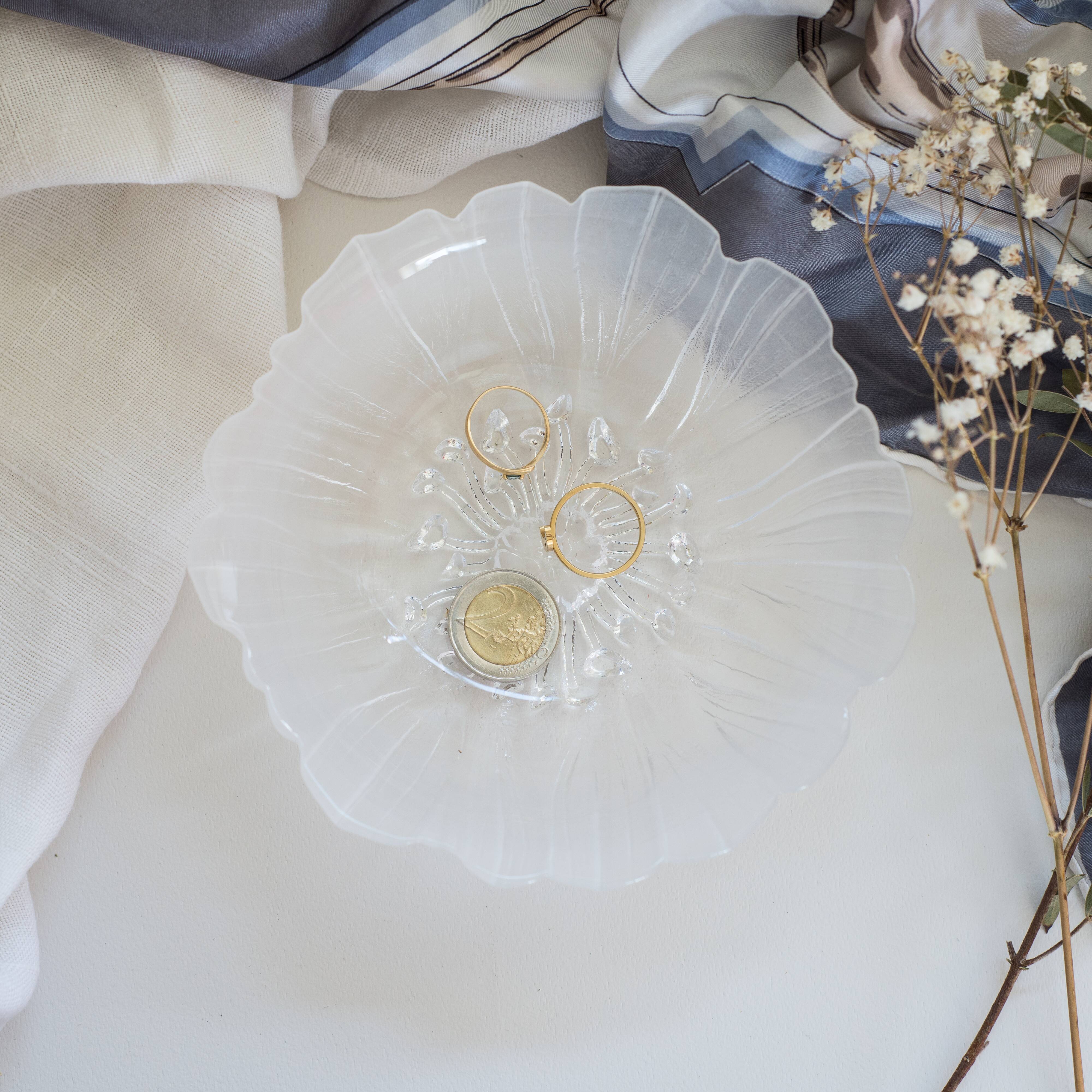 Cup or empty glass flower pocket