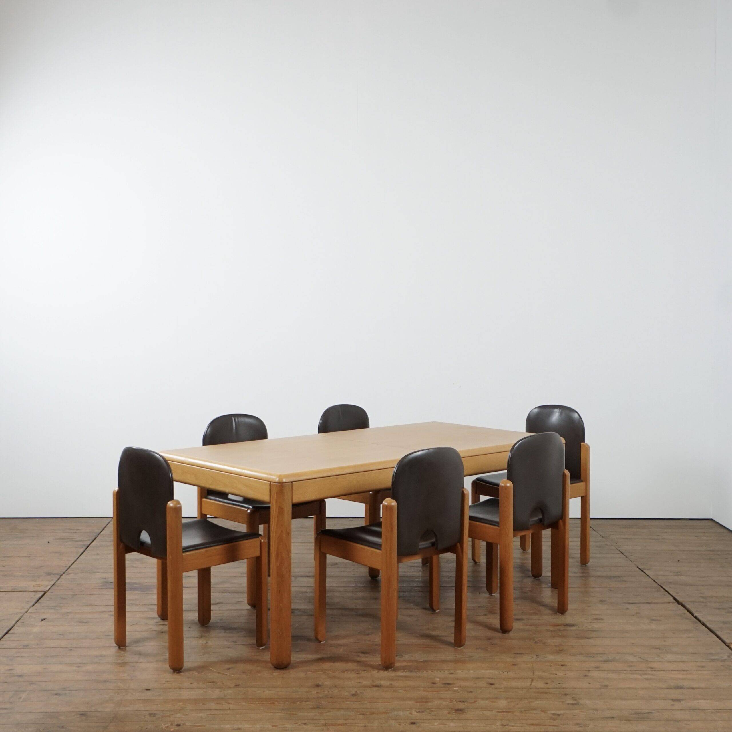 Adjustable dining set in oak and leather chairs by Van Den Berghe Pauvers