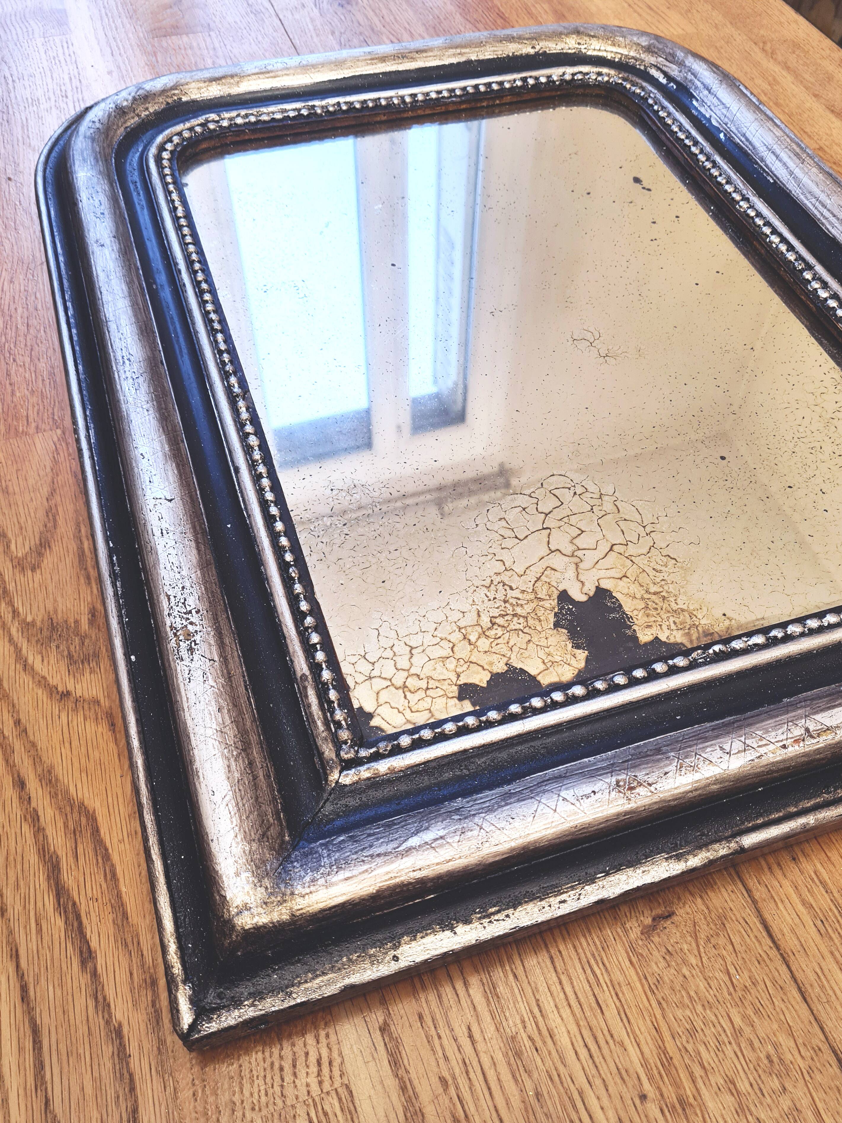 Old Louis Phillipe mirror, silvered with silver leaf.