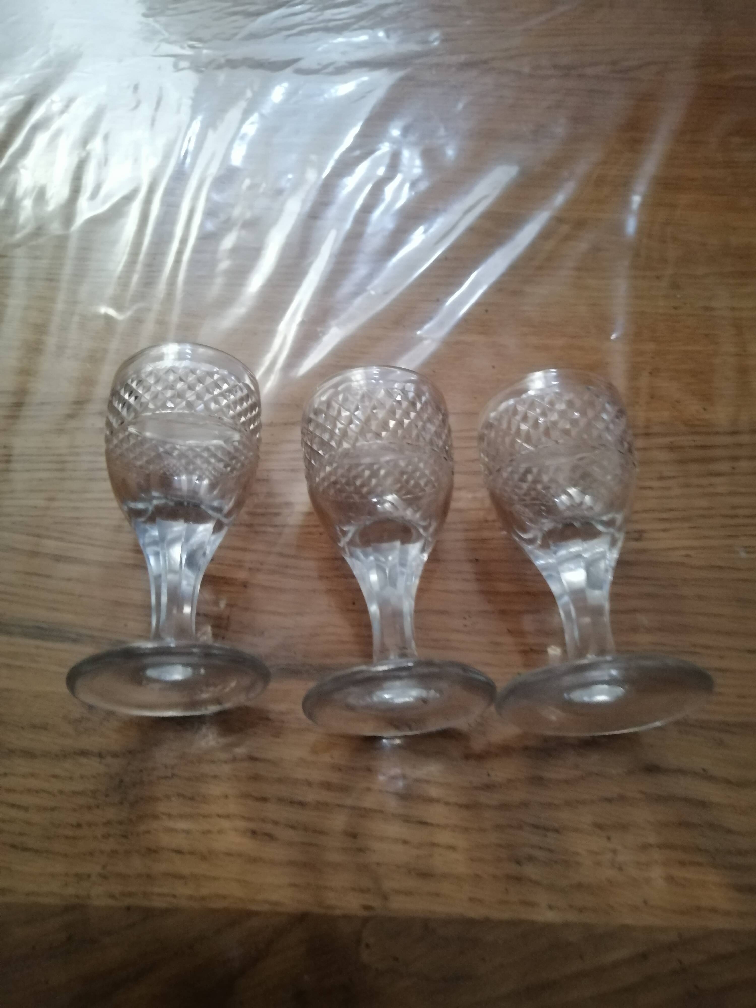 3 old vintage glass on feet