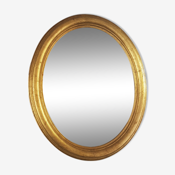Miroir ovale encadrement bois doré à la feuille d'or 58x48 cm