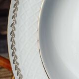 Twelve white porcelain plates