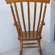 Rocking chair en bois massif vintage