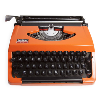 Brother 210 orange typewriter overhauled and new ribbon