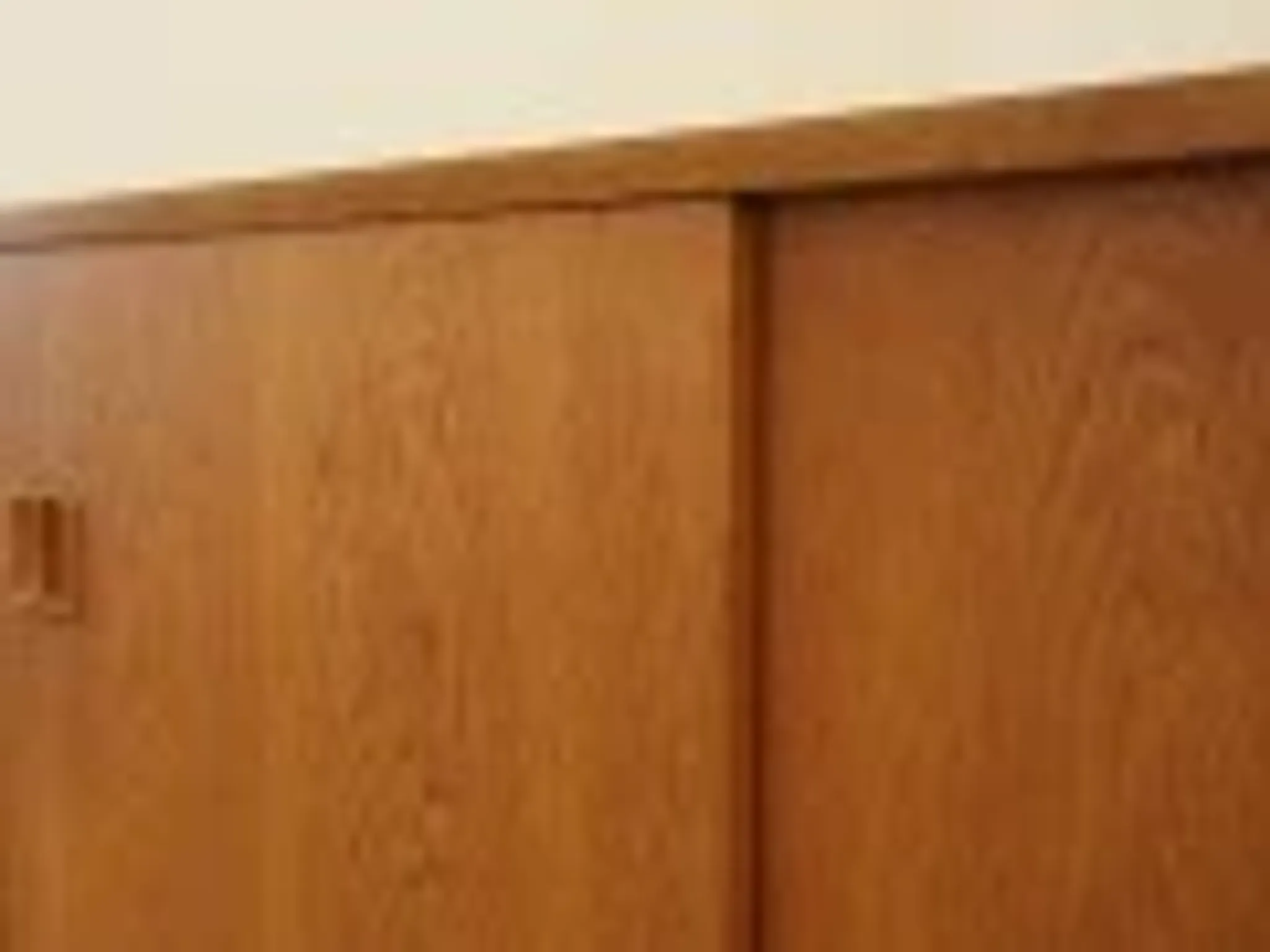 Ash cabinet with sliding doors by Hjørnebo, Danish, 1960s