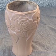Terracotta vase with a vintage ceramic relief rose pattern