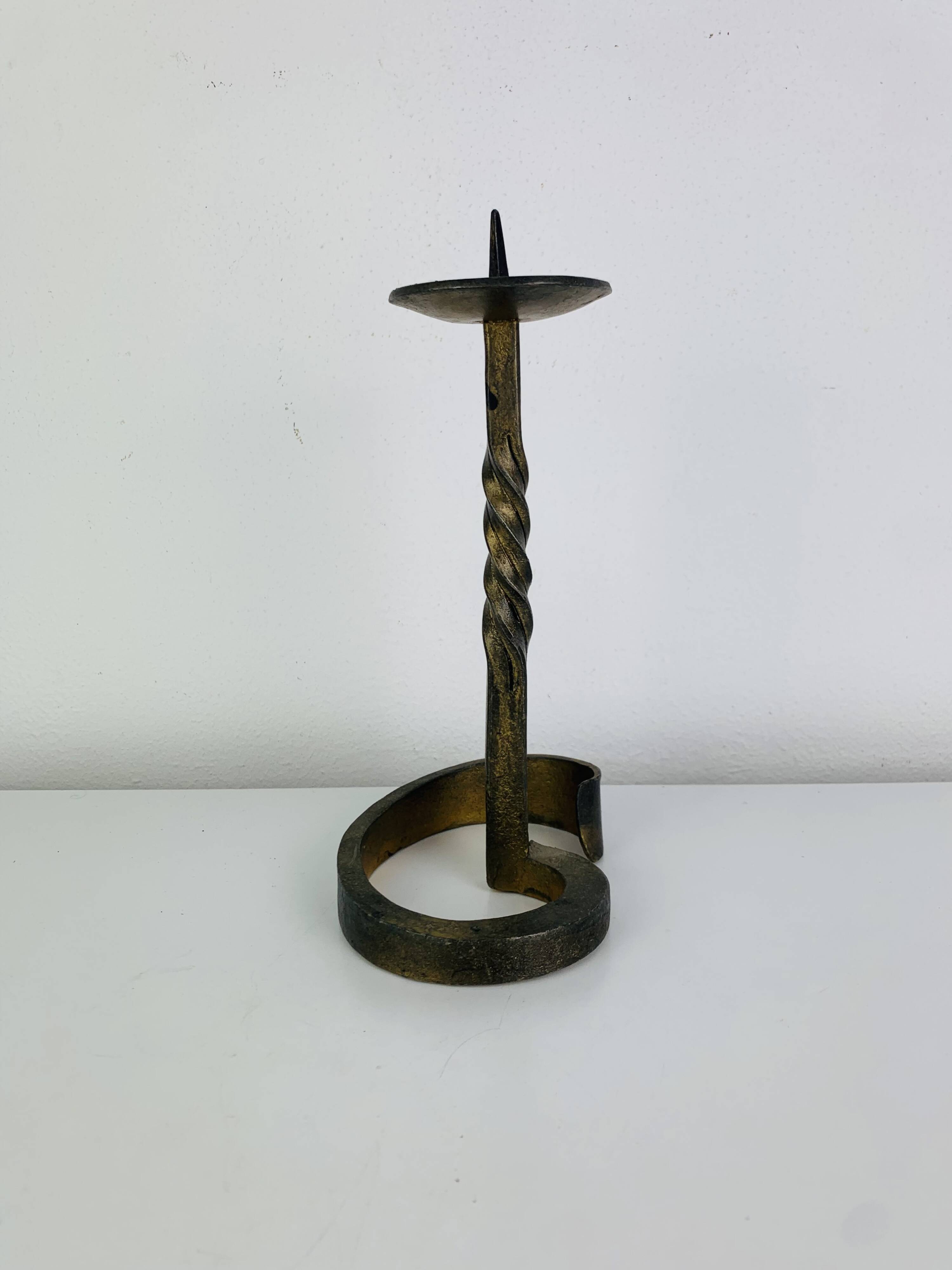 Brutalist candle holder, wrought iron with a golden patina.