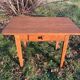 Rectangular wooden farmhouse table or rustic desk with antique drawer