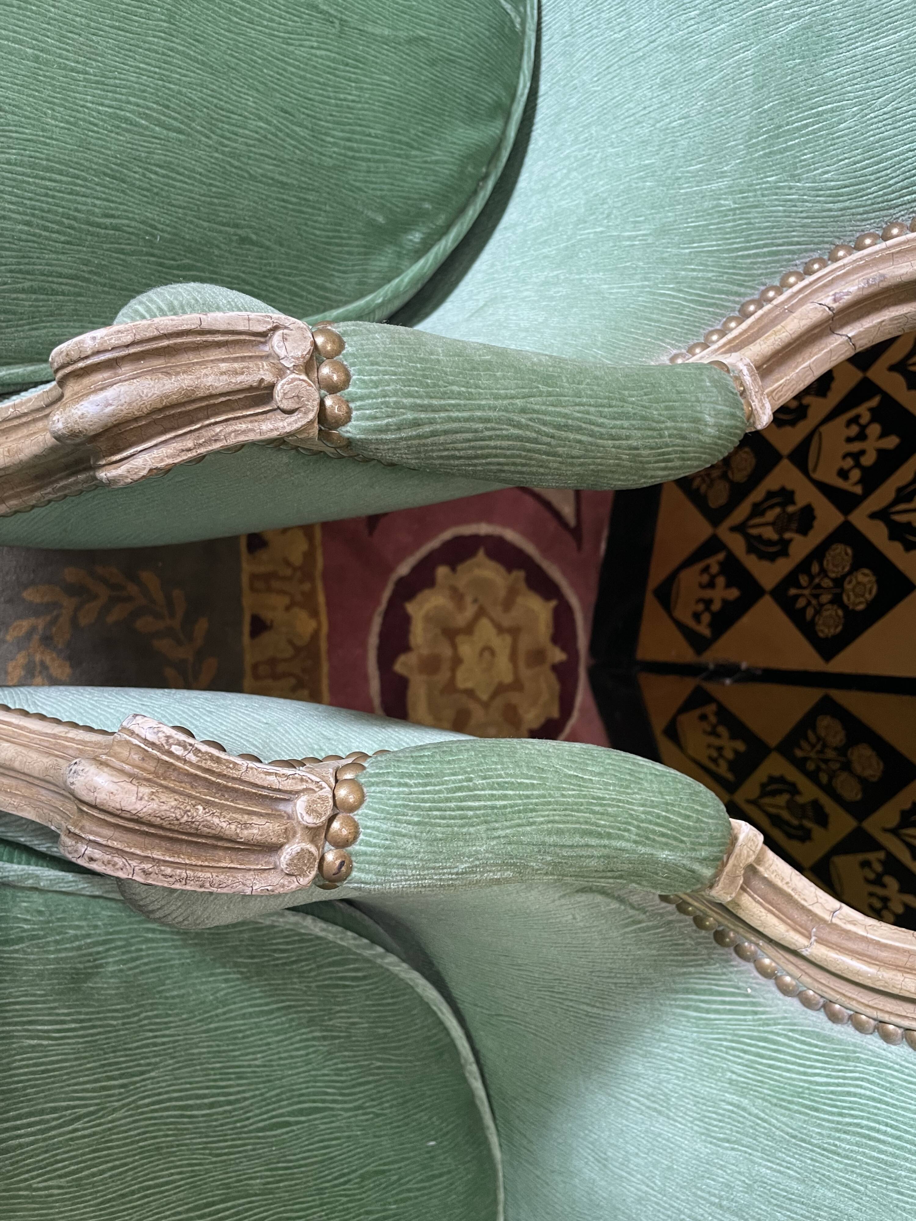 Pair of green Louis XV style bergères armchairs