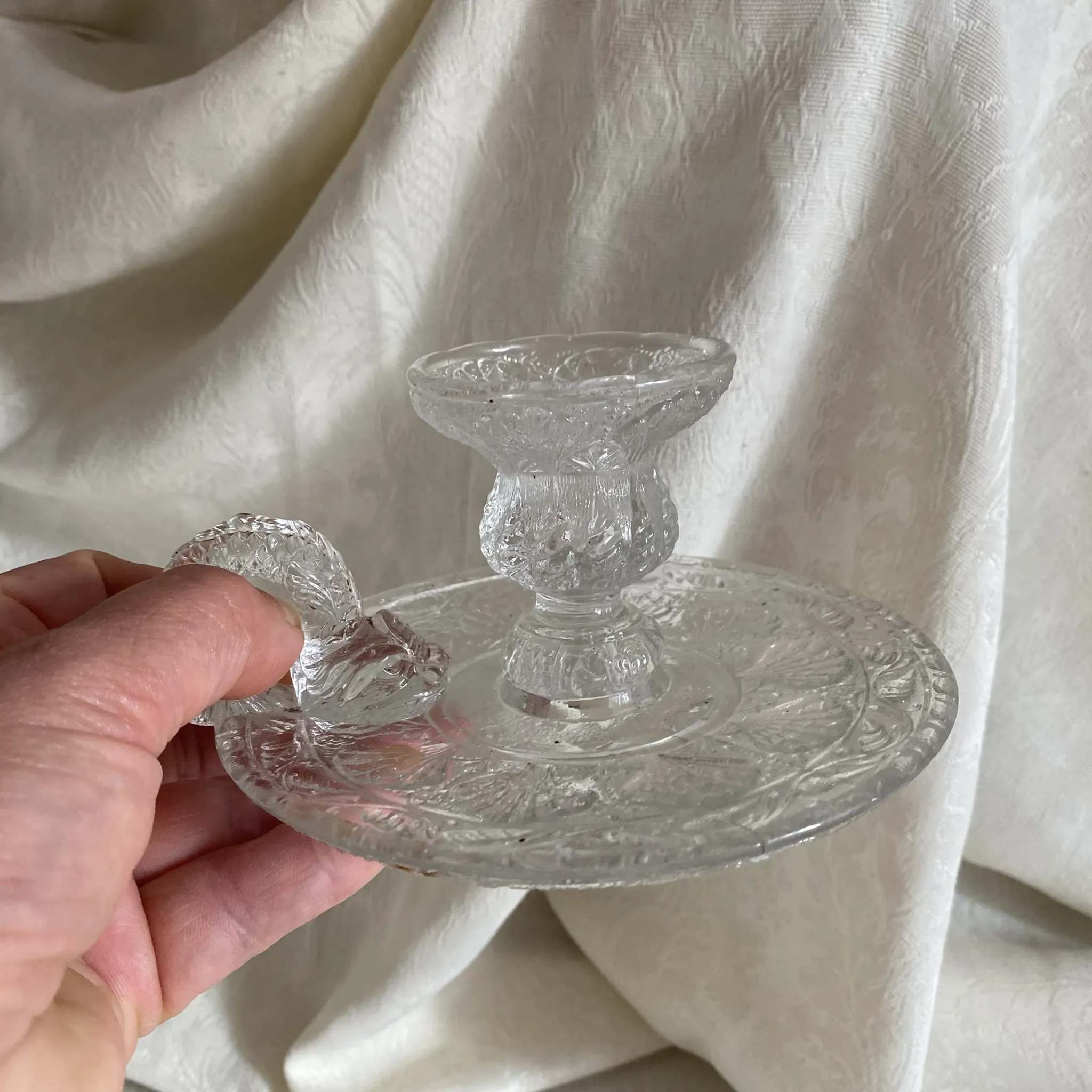 Handheld candlestick with fish handle