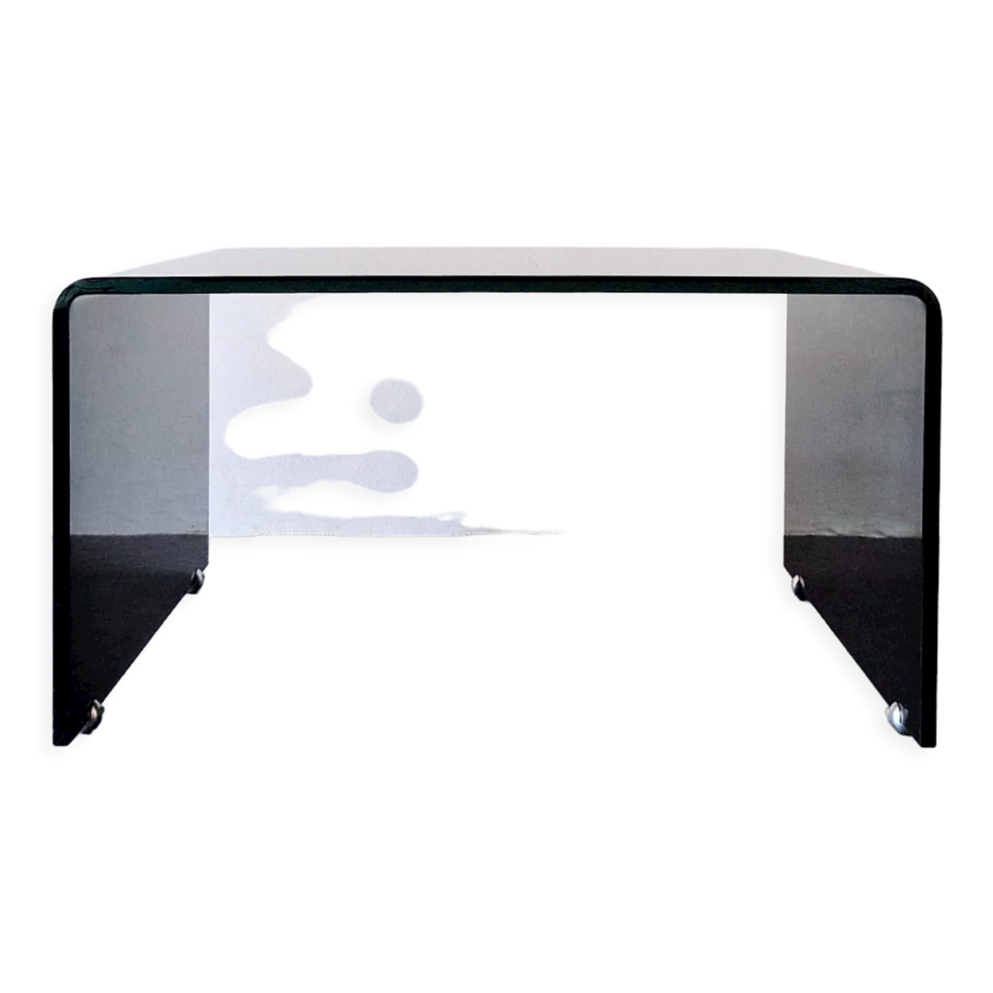 Bended black glass coffee table