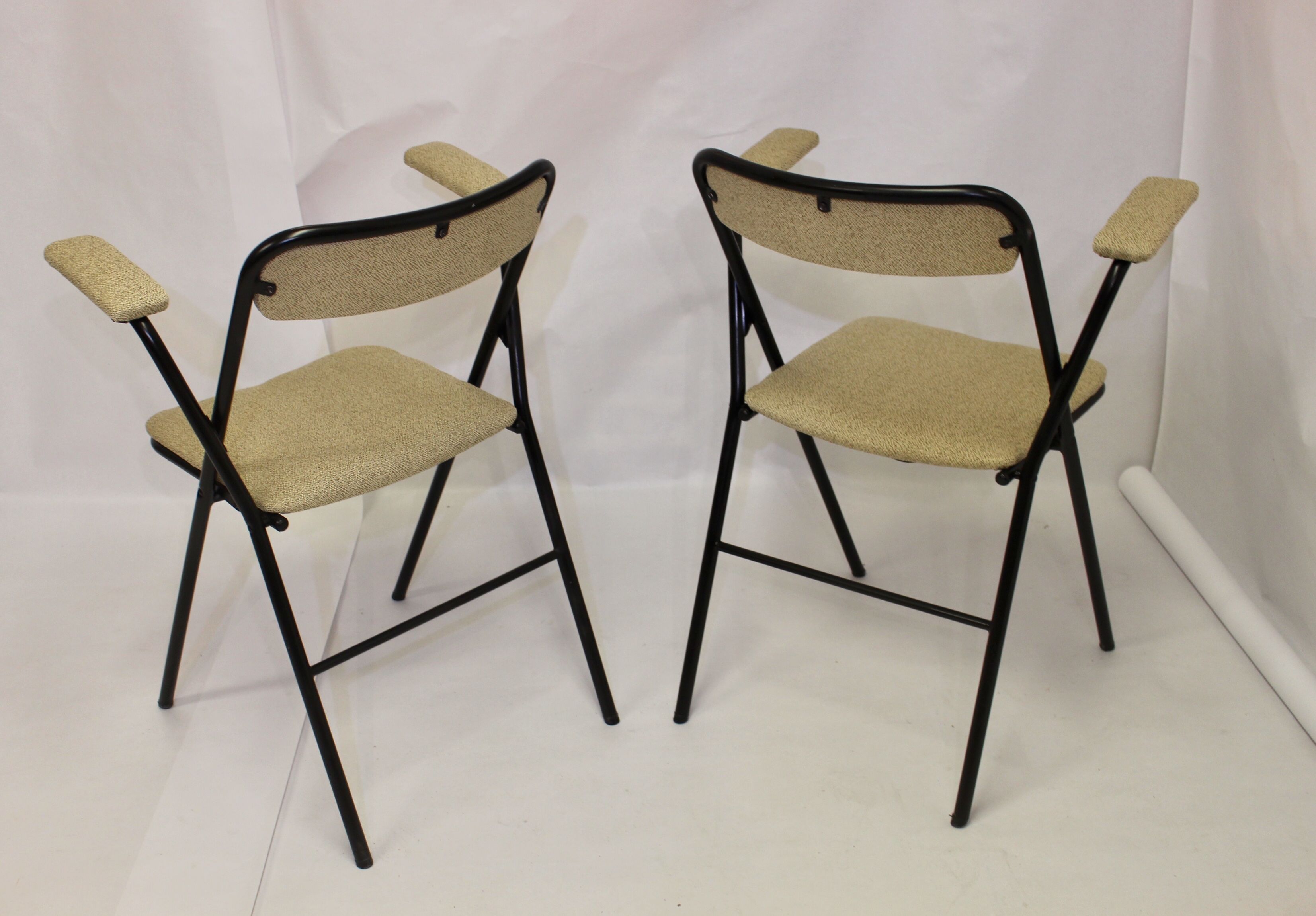 Pair of folding chairs with vintage armrests, 70s