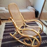 Rocking chair in arched wood and cane