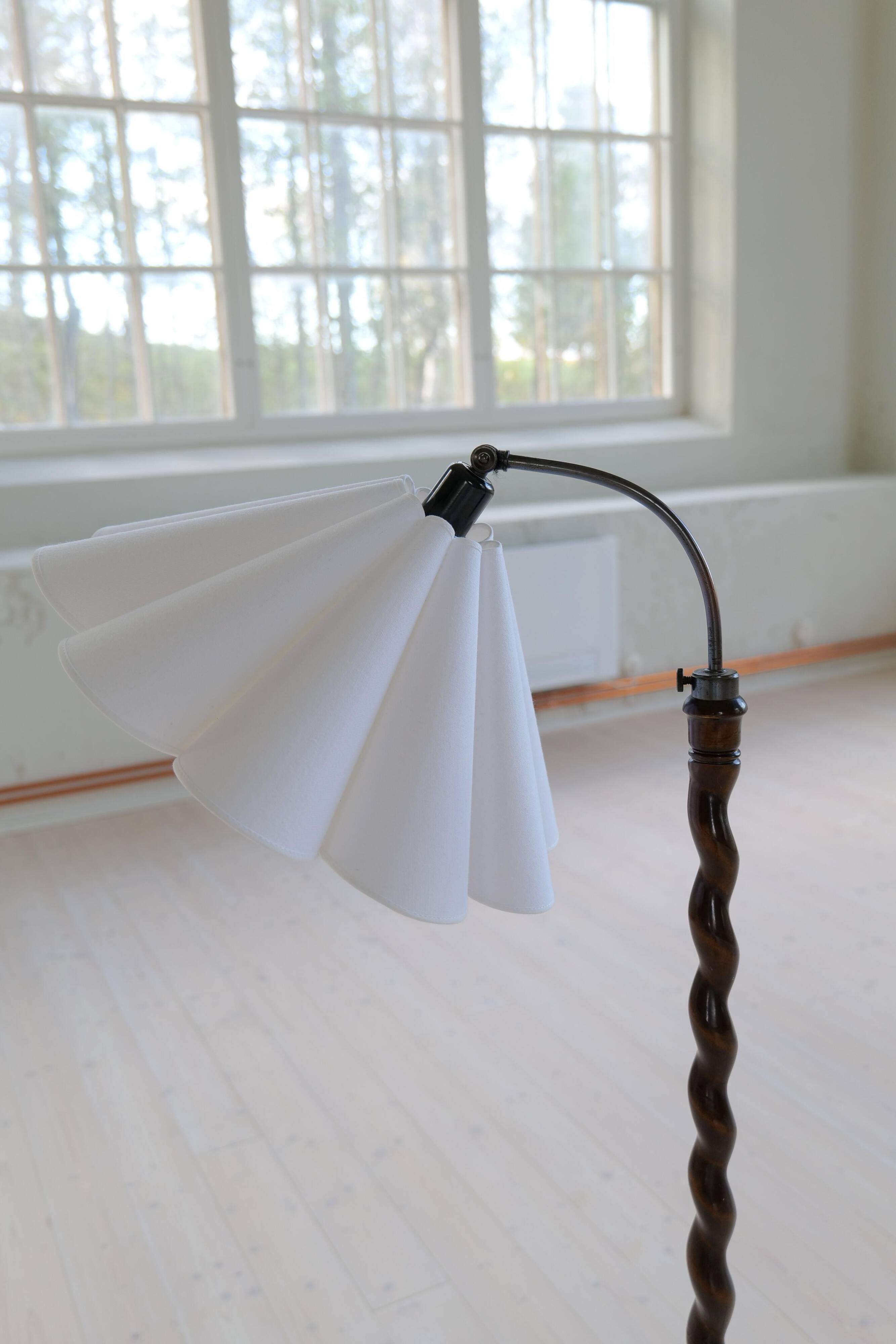 Organic whirlwind floor lamp in stained birch, Sweden, 1940s.