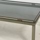 Brass coffee table with smoked glass top by Guy Lefevre, 1970s