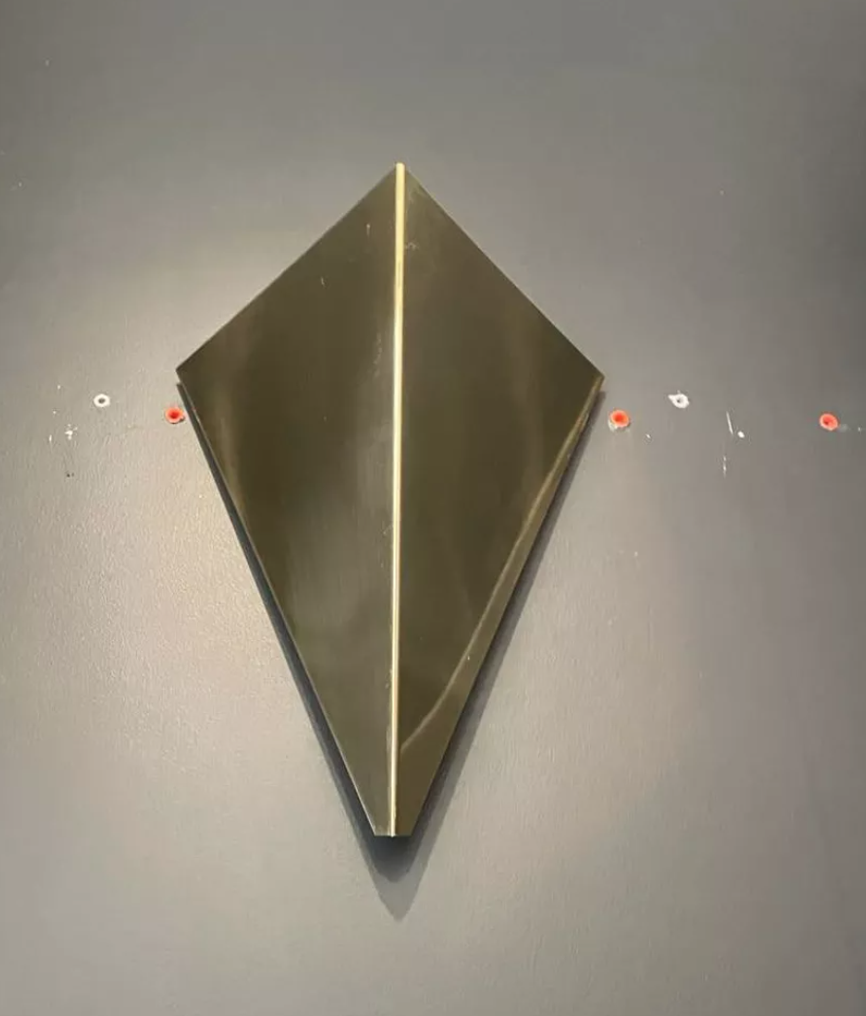 Pair of geometric vintage wall lamps in solid brass, France 1970.