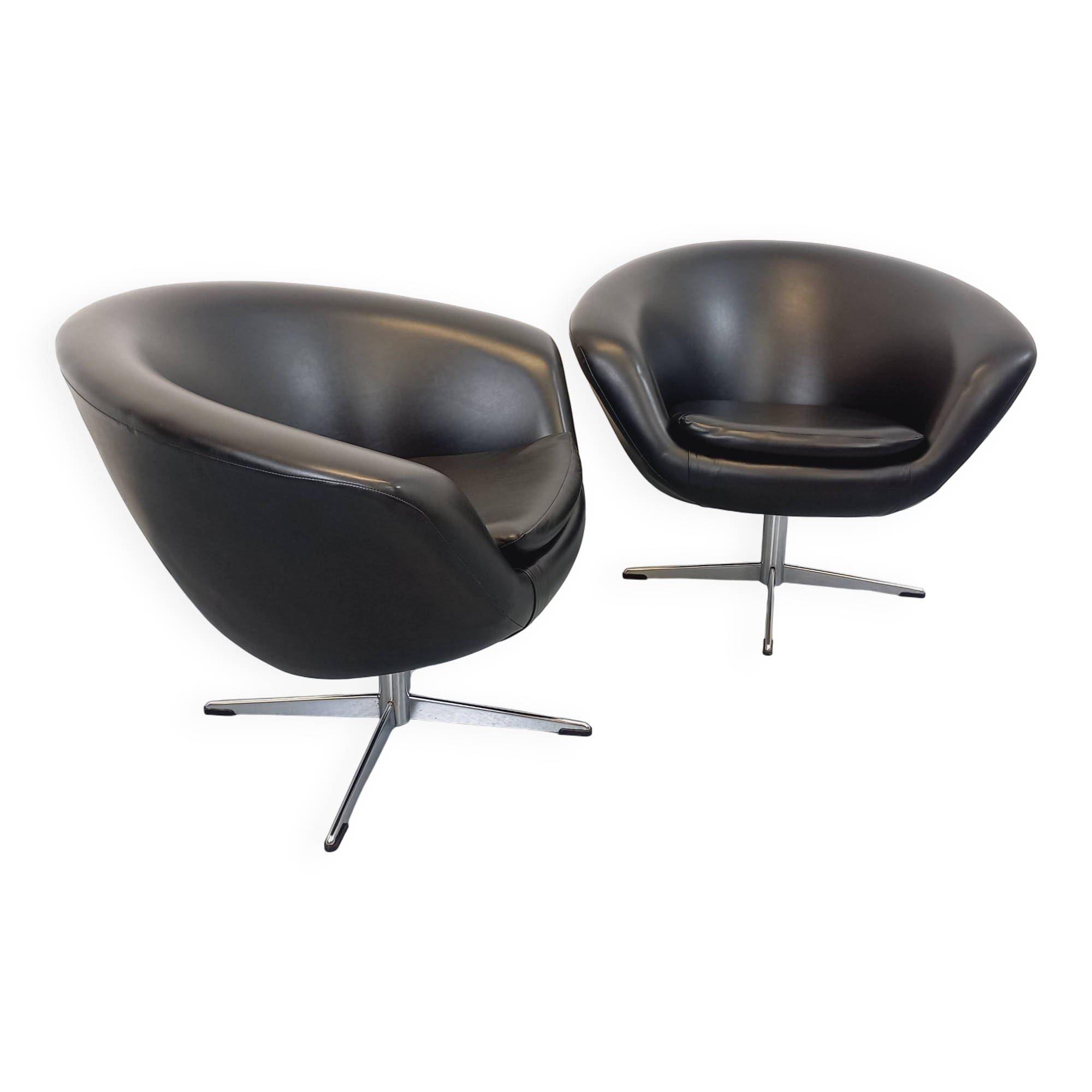 Pair of vintage Scandinavian swivel armchairs in faux leather and chrome.