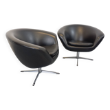 Pair of vintage Scandinavian swivel armchairs in faux leather and chrome.