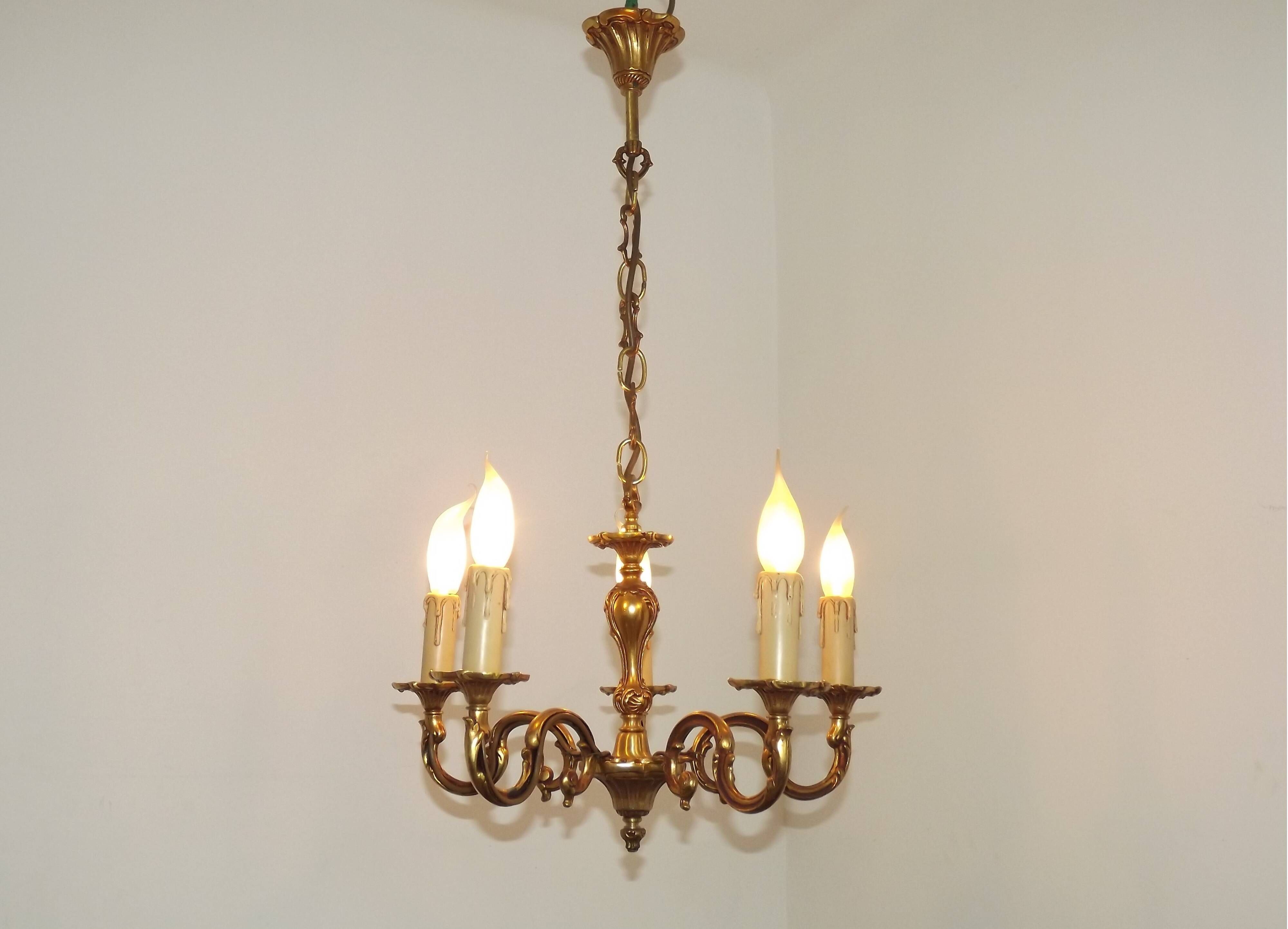 Vintage French traditional style bronze chandelier with 5 lights featuring acanthus leaf details.