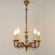 Vintage French traditional style bronze chandelier with 5 lights featuring acanthus leaf details.