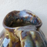 Ceramic pitcher in the shape of a coloquinte melo.