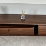 Extendable TV cabinet with walnut finish