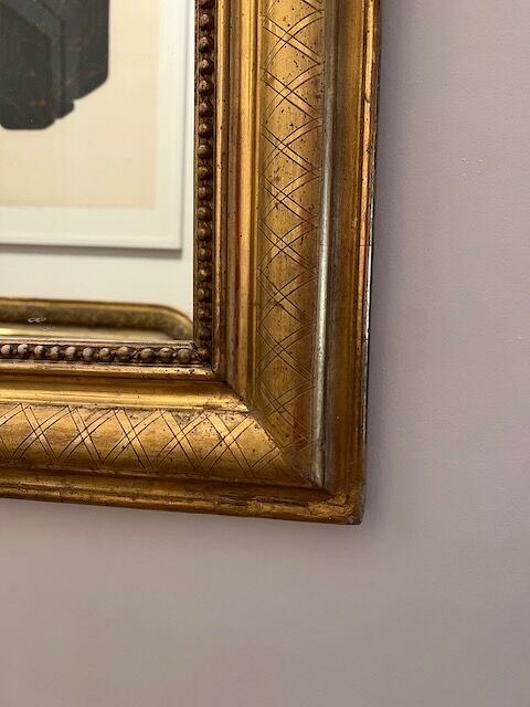 Old mirror Louis-Philippe in gilded wood