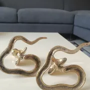 Pair of Antique Zoomorphic Cobra Candle Holders. In brass. India.