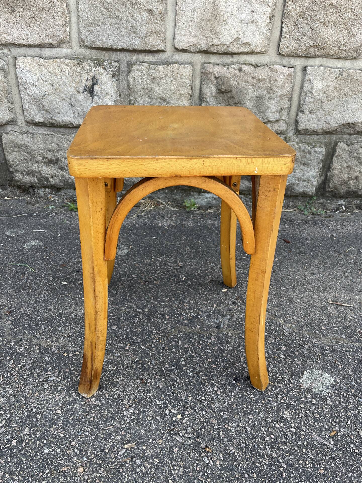 Curved wood stool in Baumann style